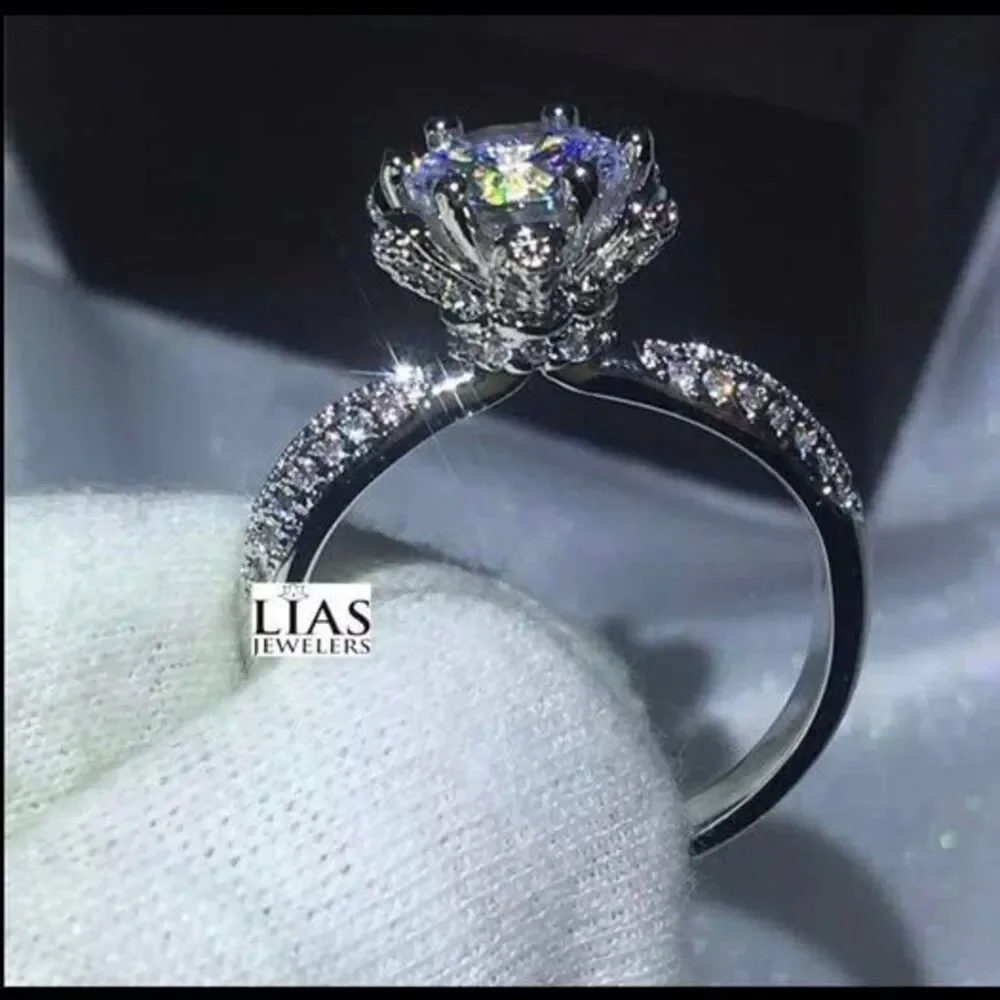 New 18k white gold engagement ring